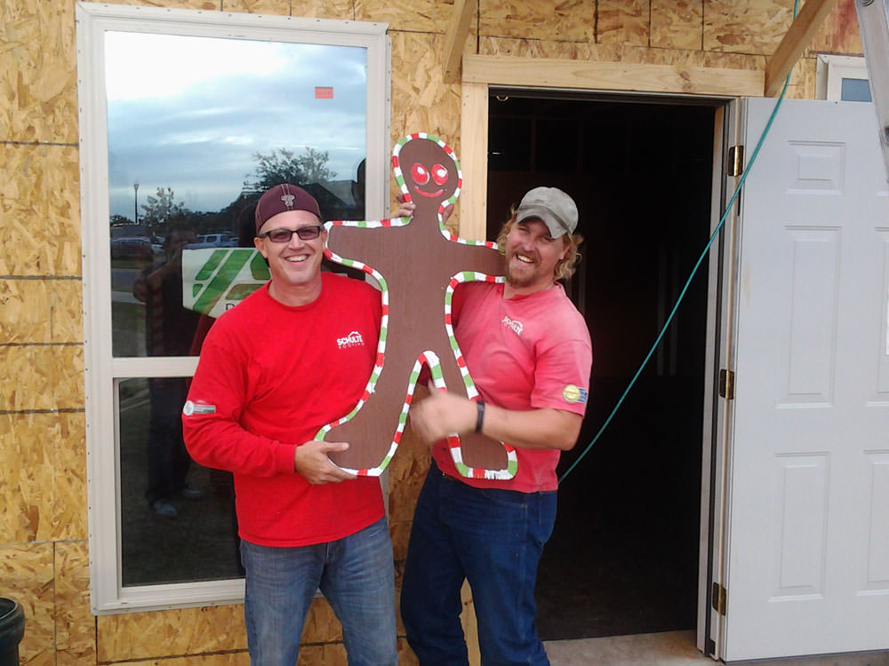 bryan roofers playing with gingerbread men