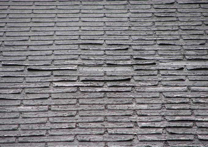 college station roofing contractors show a worn roof and its signs