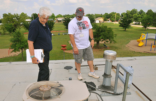 houston roofer inspects school roof with fema