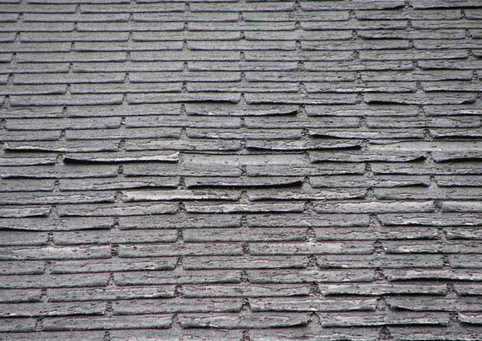 montgomery roof company shows a worn roof due to missing underlayment