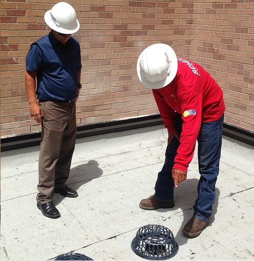 schulte roofing inspecting a houston roof mini