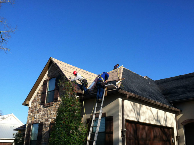 metal shingle roof by a Bryan roofer