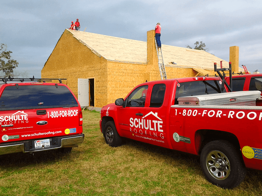 Schulte Roofing working on the World Record Gingerbread House