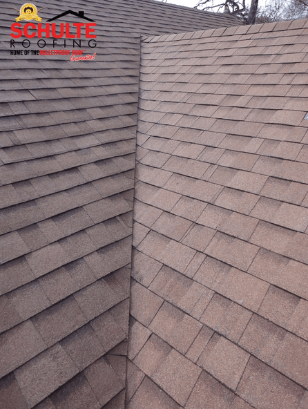 College Station roofer calculates shingles needed for roof valley.