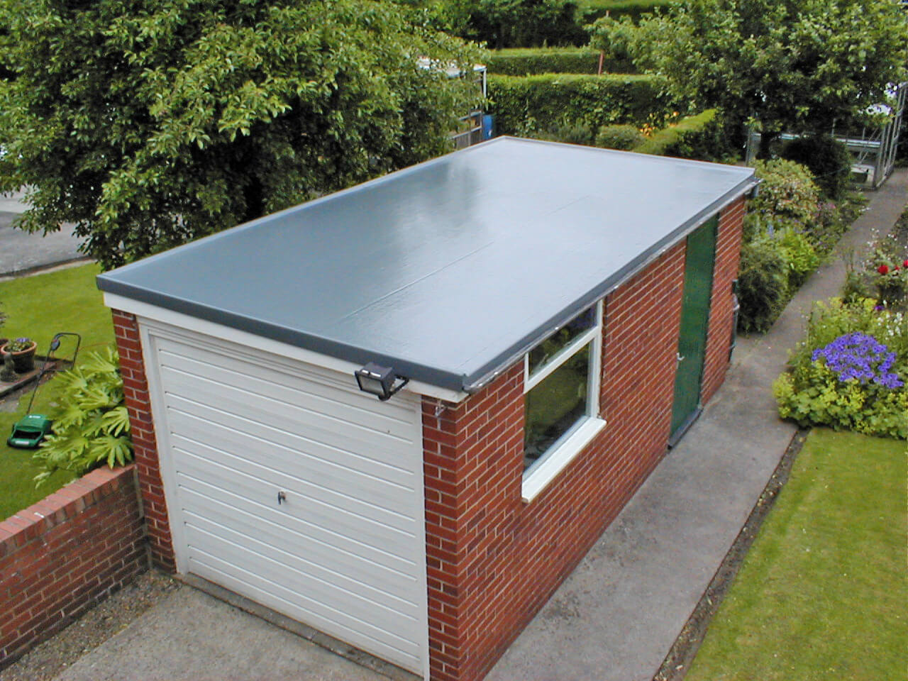 Schulte Roofing Garage with a Flat Roof