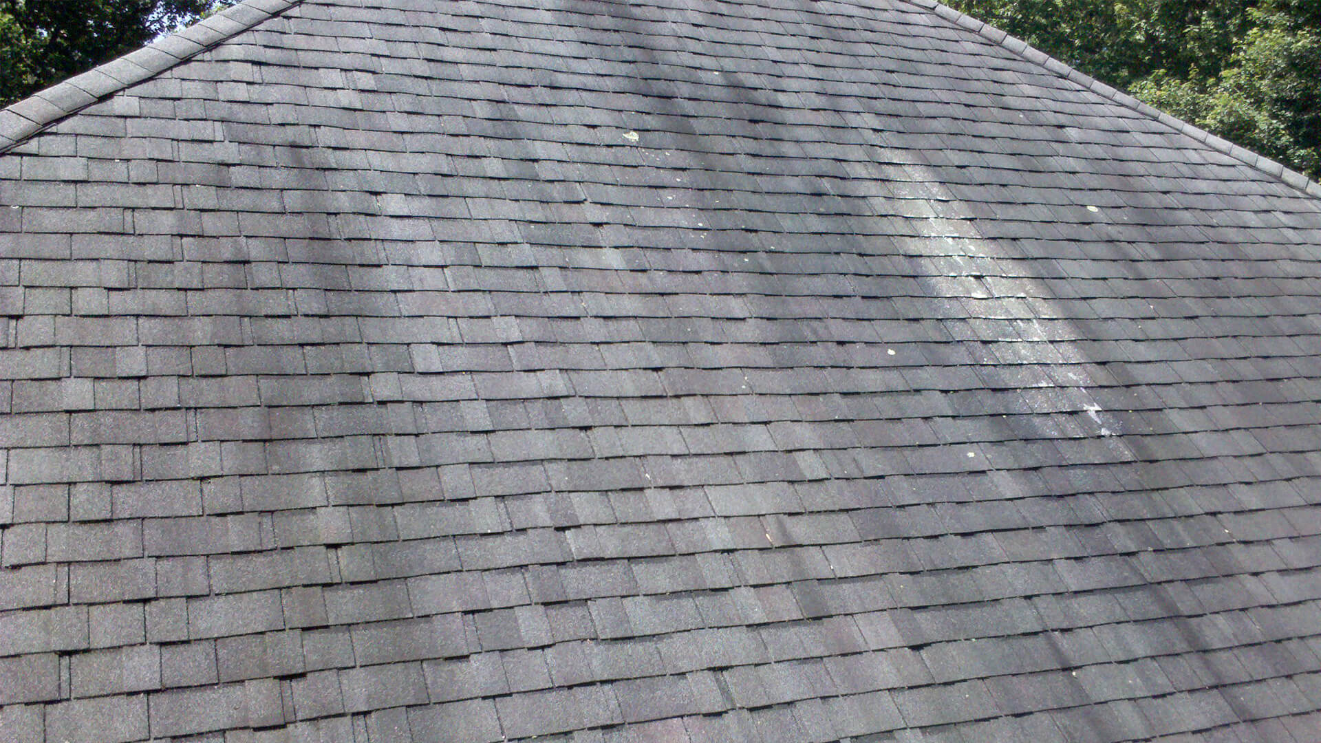 Roofing Info: Normal Wear and Tear vs. Roof Damage - Goodrich Roofing