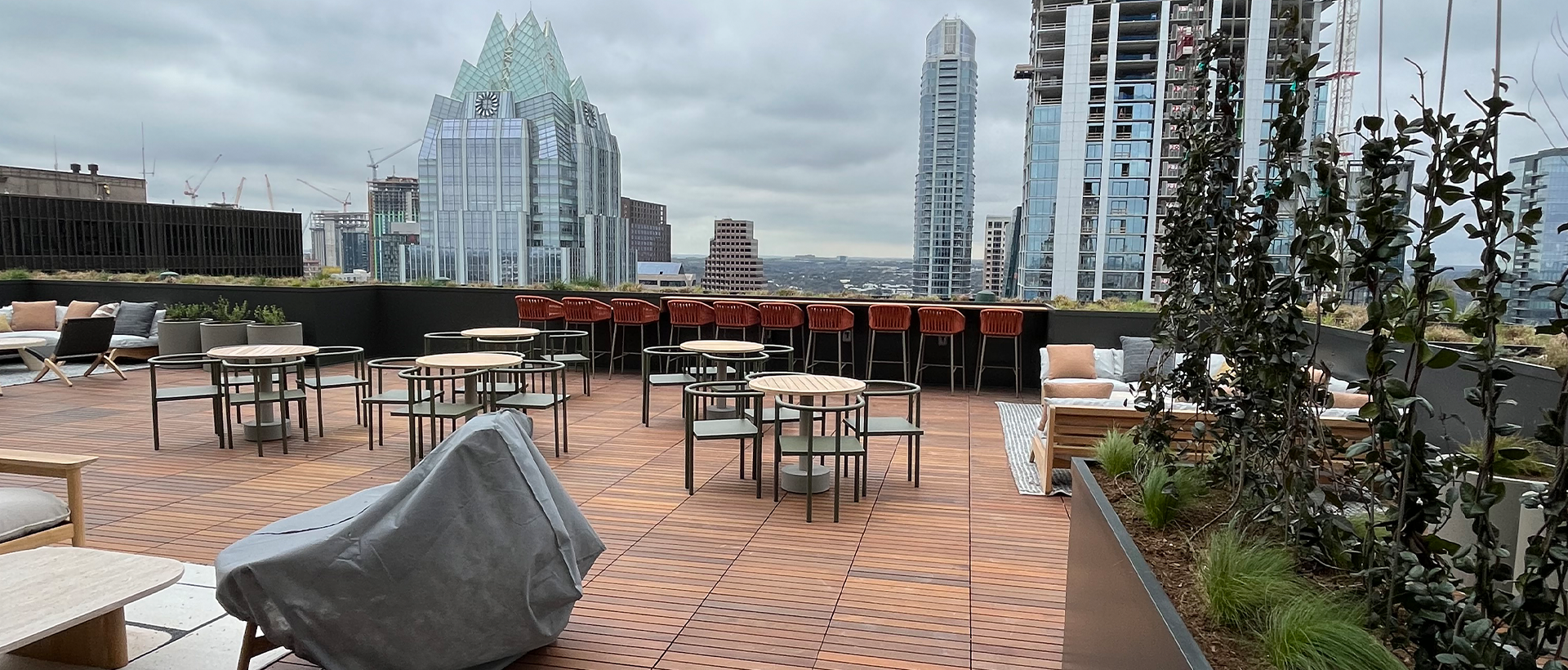 600 Congress Rooftop Transformation in Austin Custom water management system with tapered insulation and flashings integrated into the 600 Congress rooftop by Schulte Roofing.